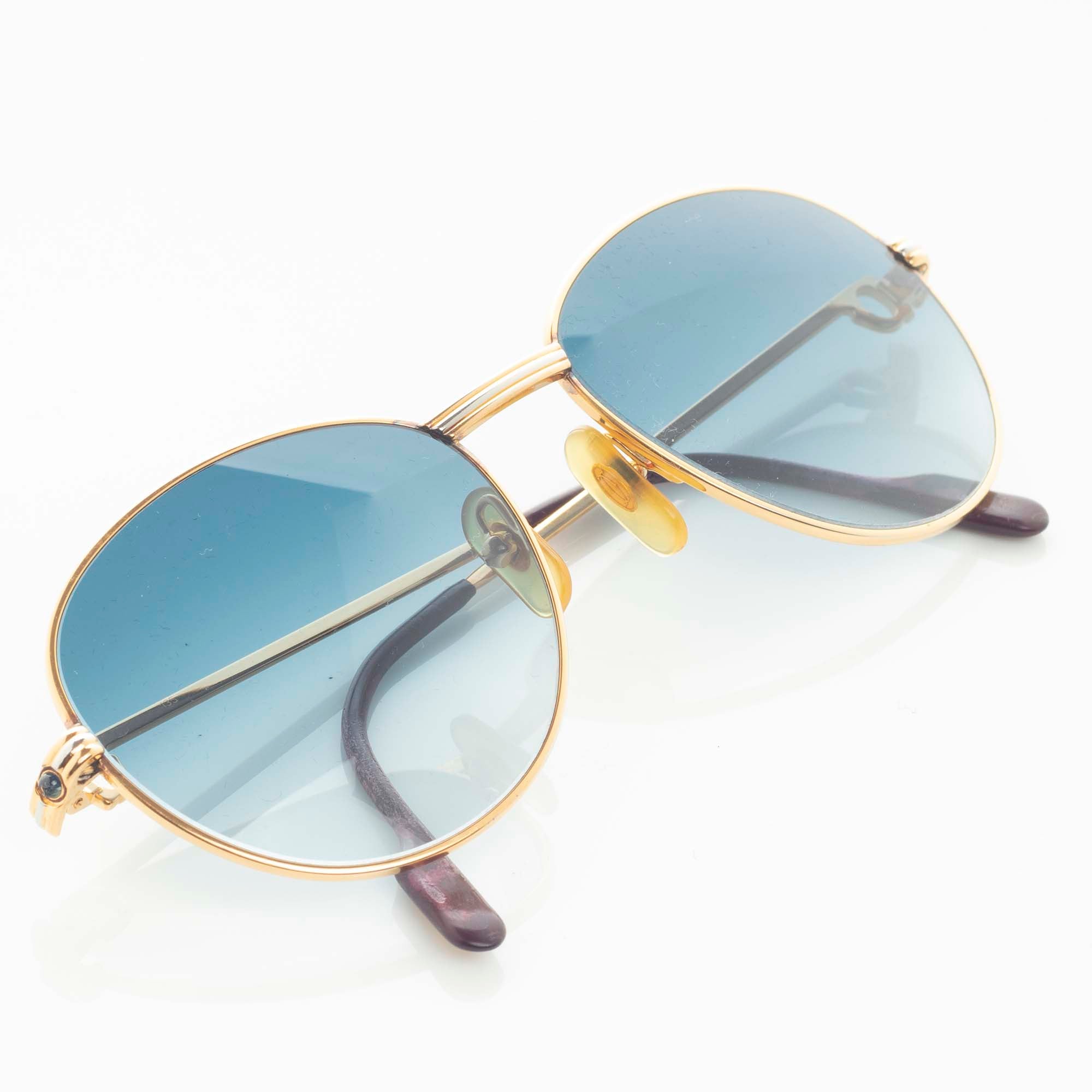Lunette cartier verre bleu sale